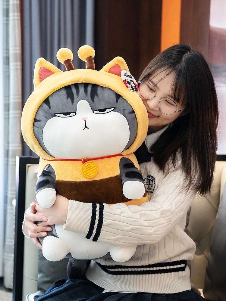 Kawaii Katze Bienenstofftier umarmt