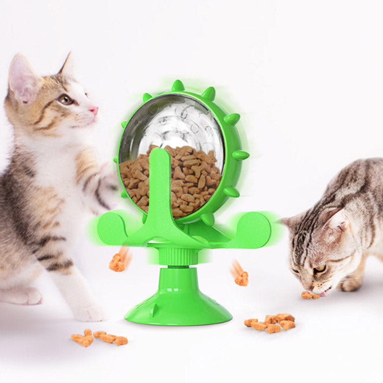 Windmühlenspielzeug mit Katzen in Grün