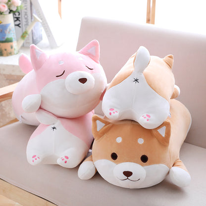 Pinke und braune Hundestofftiere